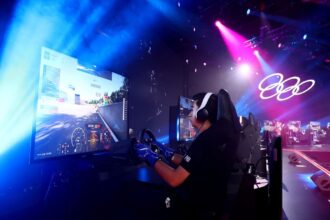 SINGAPORE, SINGAPORE - JUNE 25: Inigo Anton of Team Philippines competes in the Gran Turismo motor sport qualifying rounds on day four of the Olympic Esports Week at Suntec Singapore Convention & Exhibition Centre on June 25, 2023 in Singapore. (Photo by Yong Teck Lim/Getty Images)