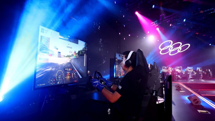 SINGAPORE, SINGAPORE - JUNE 25: Inigo Anton of Team Philippines competes in the Gran Turismo motor sport qualifying rounds on day four of the Olympic Esports Week at Suntec Singapore Convention & Exhibition Centre on June 25, 2023 in Singapore. (Photo by Yong Teck Lim/Getty Images)
