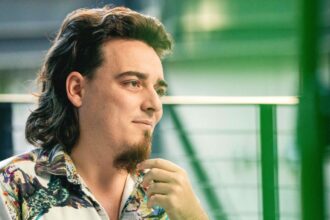 Palmer Luckey strokes his goatee.