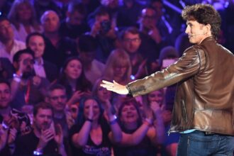 The director and executive producer at Bethesda Game Studios, Todd Howard, addresses the crowd about the new Fallout video game during the Bethesda E3 conference at LA Live in Los Angeles, California on June 10, 2018. - The three day E3 Game Conference begins on Tuesday June 12.