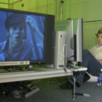 Elijah Wood plays an Xbox 360 in 2005.