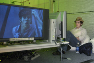 Elijah Wood plays an Xbox 360 in 2005.