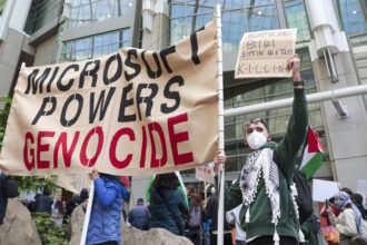 Pro-Palestinian demonstrators protest outside the Microsoft Build conference at the Seattle Convention Center in Seattle, Washington on May 19, 2025. (Photo by Jason Redmond / AFP) (Photo by JASON REDMOND/AFP via Getty Images)