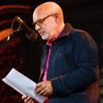 LONDON, ENGLAND - APRIL 18: Brian Eno speaks during SUMUD, a fundraising event for Palestine, organised by the Amos Trust, at Union Chapel on April 18, 2024 in London, England. Sumud, meaning 'steadfast perseverance' in Arabic, is a common term used to describe Palestinian non-violent, resistance against Israel's occupation. Amos Trust is a small, creative human rights organisation who have been working in Palestine for over 30 years with local and international peace activists, partnering with grass-roots projects, campaigning for Palestinian rights. (Photo by Jim Dyson/Getty Images)