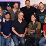 An image of the Critical Role crew posing with senior designers Jeremy Crawford and Chris Perkins, former employees of Wizards of the Coast.